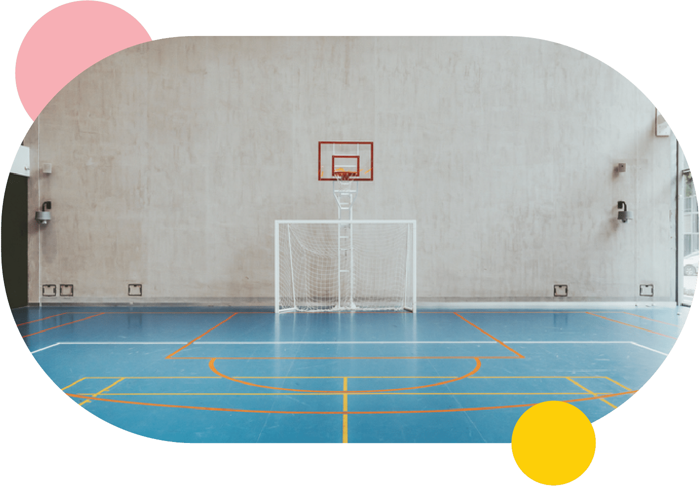 An empty basketball court available for facility rentals, complete with a basketball hoop.