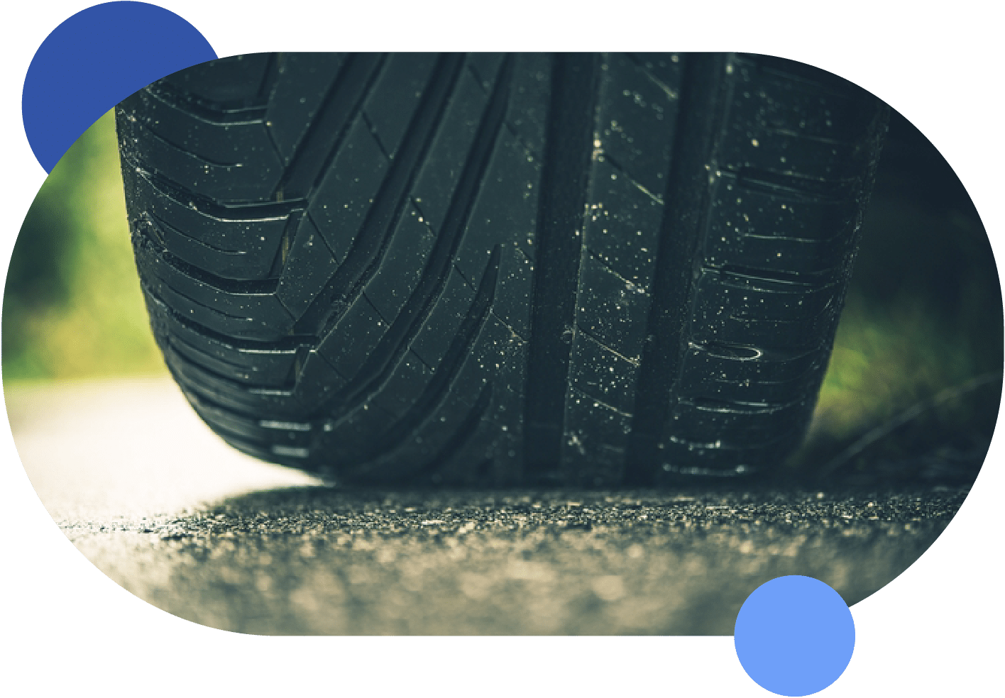 A close up of a tire on a road rented out by a facility.