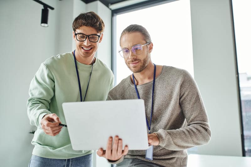 realtime smiling architectural designer in eyeglasses